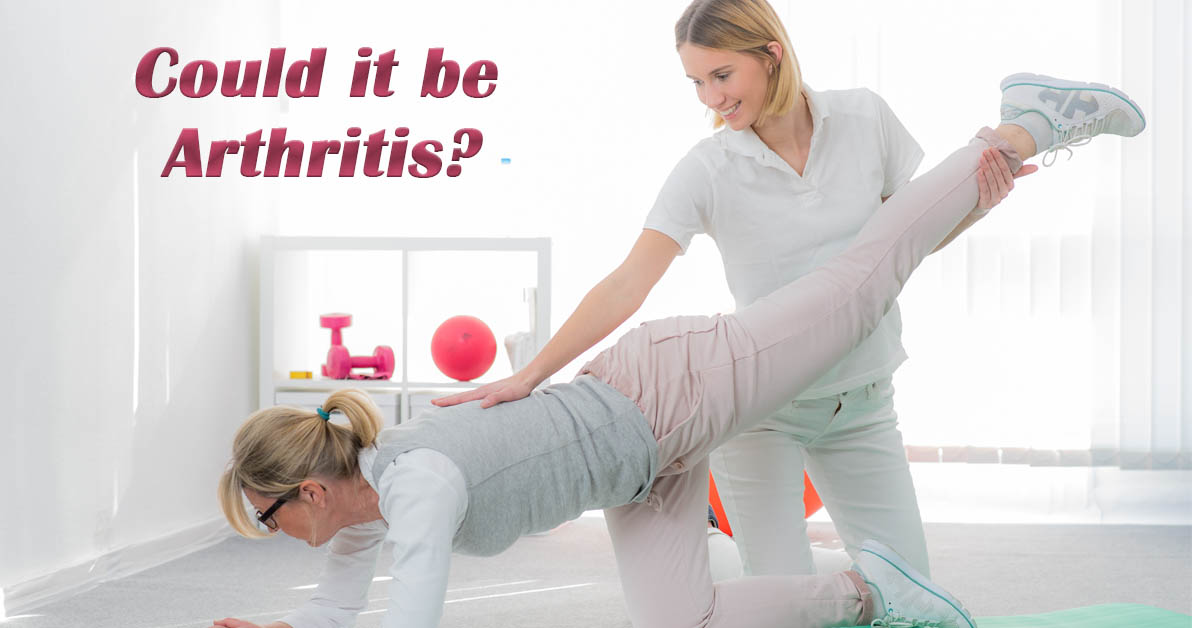 Arthritis Back Pain. Picture of a young caucasian female getting her back worked on by a young caucasian female physical therapist.