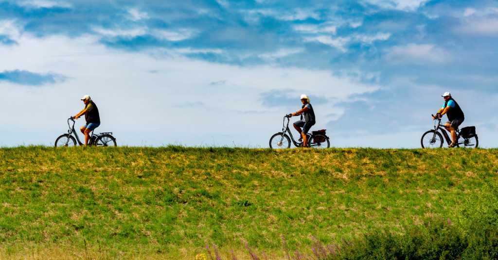 People riding bicycles