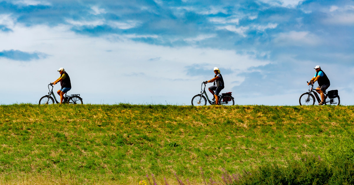 People riding bicycles